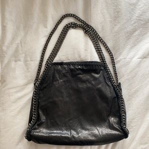 Black purse with chain link straps and coin purse